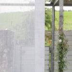 Flächenvorhang weiss transparent Ausblick Garten